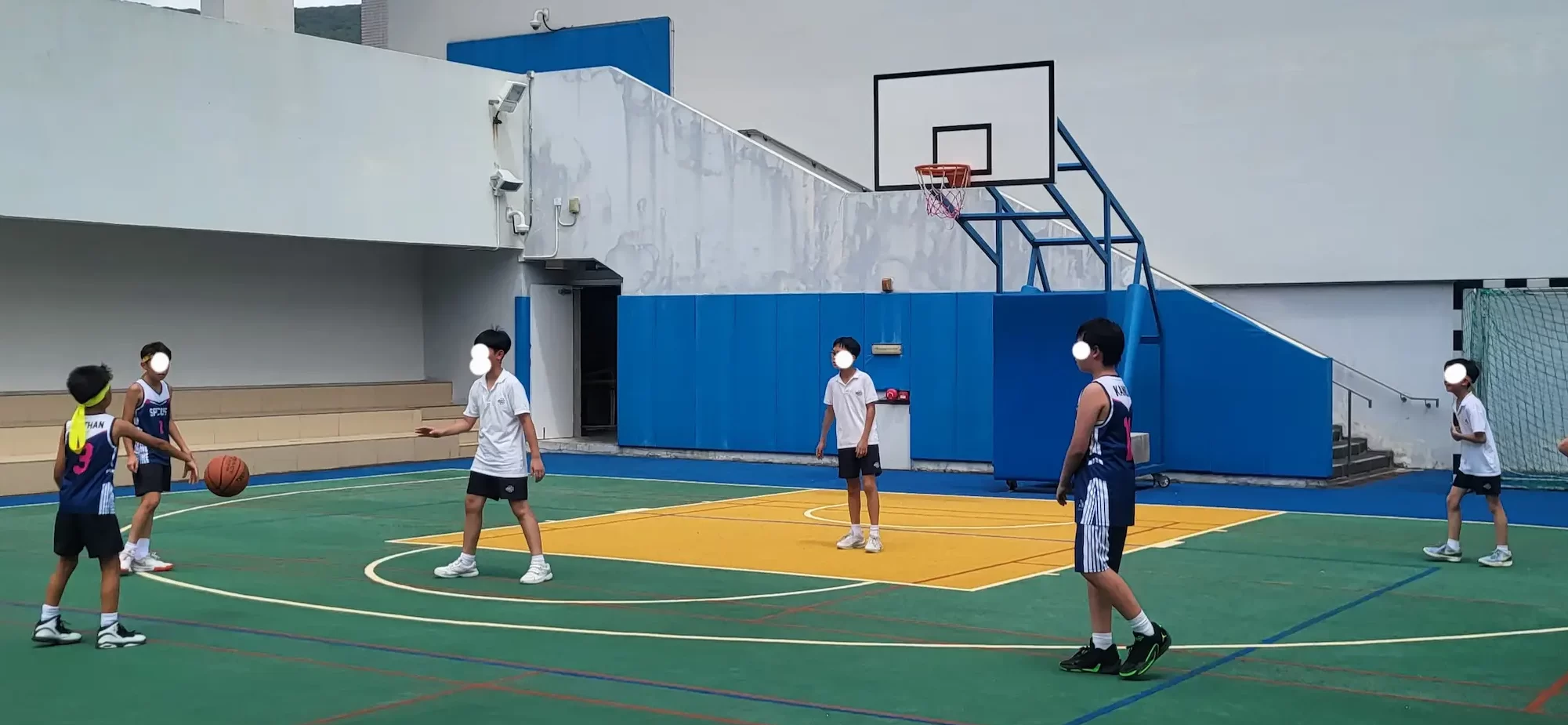 Primary-hero-picture-students-playing-basketball